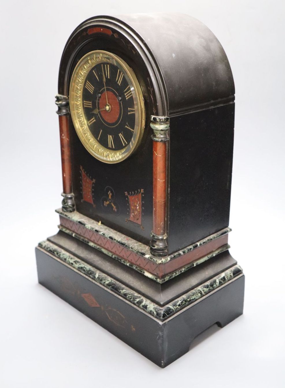 A Victorian black slate and rouge marble mantel clock, with French bell-striking movement, 43cm high
